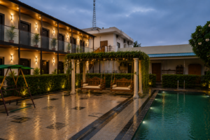 resort with pool in manesar